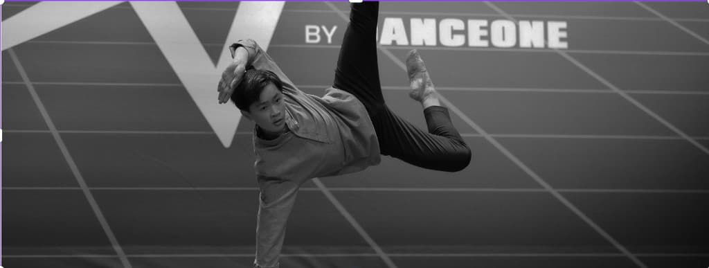 Dancer mid-leap — 925 Dance Collective